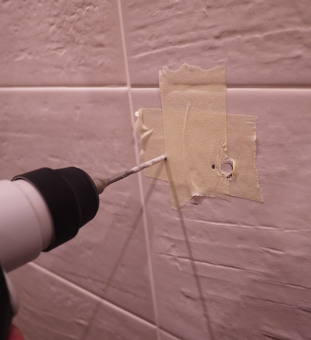 use masking tape if you want to know how to drill a hole in a porcelain tile