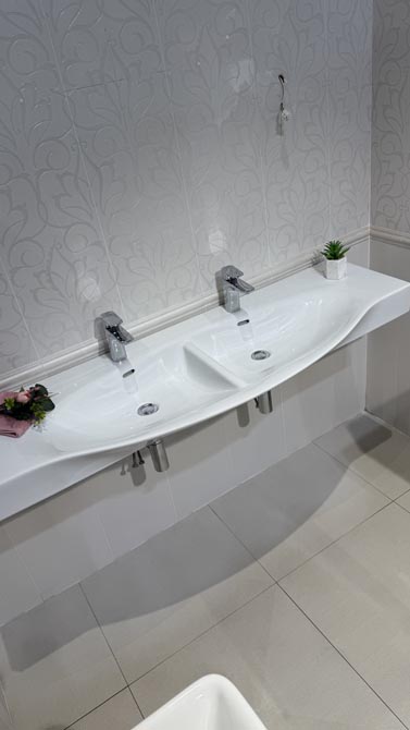 Laufen palace double wash basin with taps shelves and waste